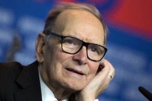 Composer Ennio Morricone speaks during a news conference as he promotes the movie "The Best Offer" at the 63rd Berlinale International Film Festival in Berlin February 12, 2013. REUTERS/Thomas Peter (GERMANY - Tags: ENTERTAINMENT)